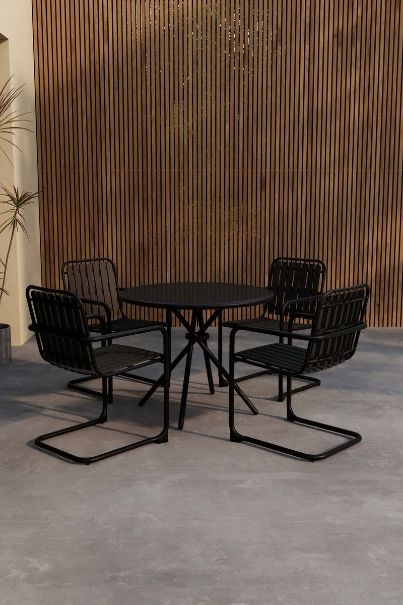 Chios rundes Gartenmöbel-Set mit Tisch Ø 90 cm und 4 Stühlen in Schwarz, im Wohnraum