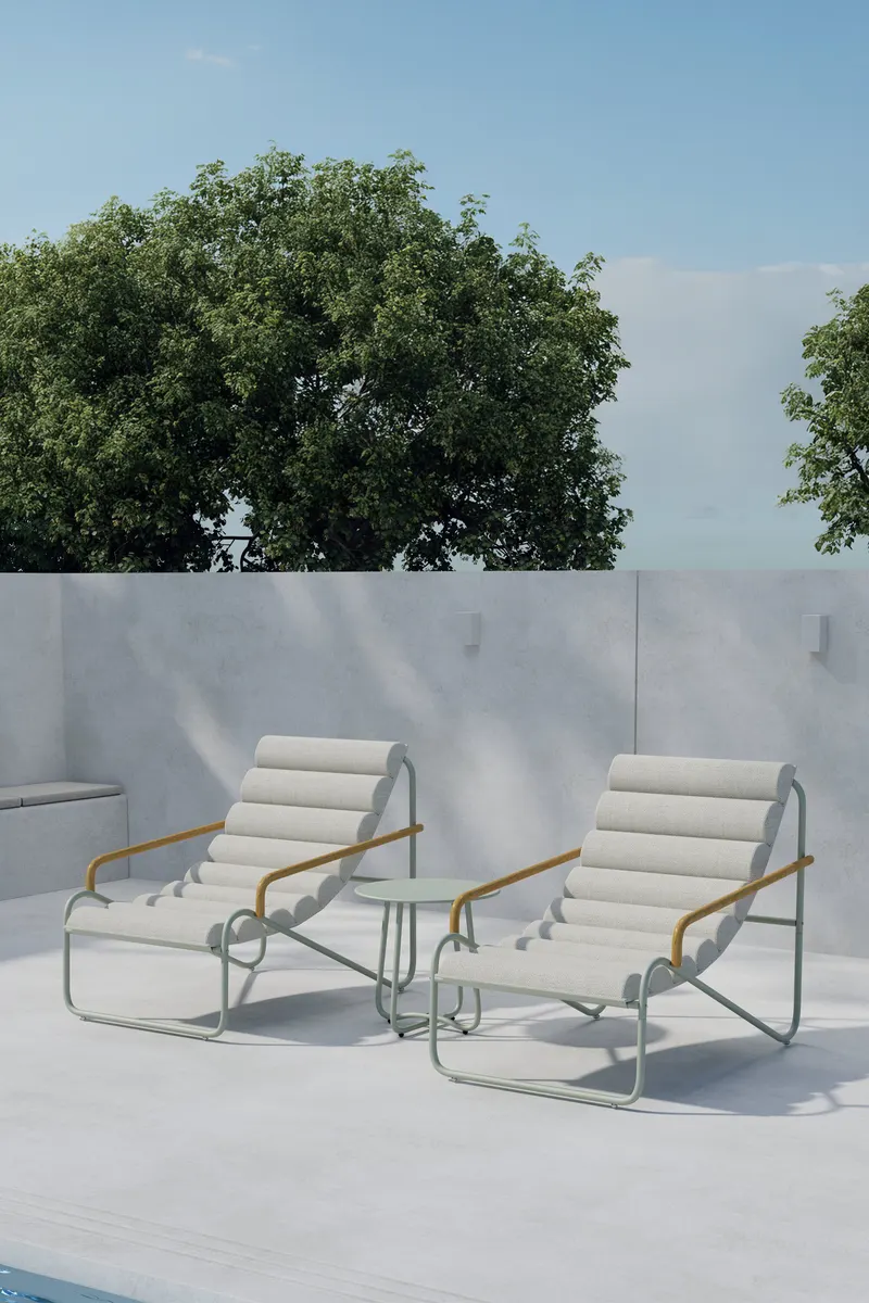 Ithaka Gartenlounge mit zwei Loungesesseln und Rundtisch in Grün, im Wohnraum