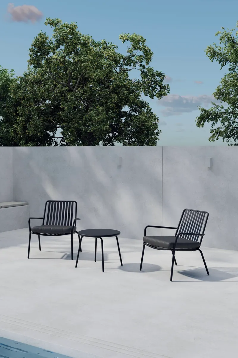 Mykonos Gartenlounge mit zwei Sesseln und rundem Tisch in Schwarz, im Wohnraum