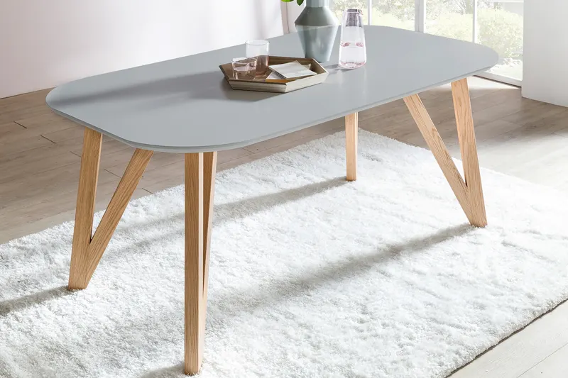 Essgruppe mit grauem Tisch und goldfarbenen Stühlen, Ansicht 3